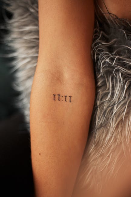 Branding symbol 11:11 tattoo representing timing and precision